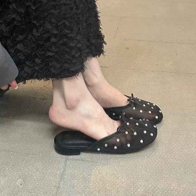 French temperament mesh hollow flat-soled slippers for women in summer wear with a pedal of water rhinestone bow and head sandals
